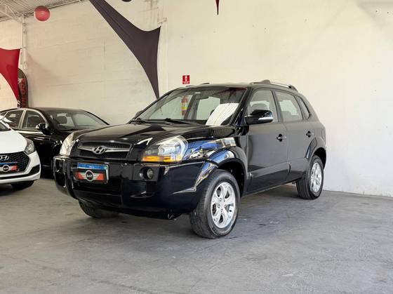 HYUNDAI TUCSON 2.0 MPFI GLS 16V 143CV 2WD FLEX 4P AUTOMÁTICO HYUNDAI TUCSON 2.0 MPFI GLS 16V 143CV 2WD FLEX 4P AUTOMÁTICO